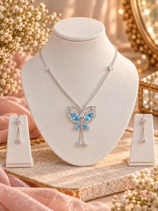 Aqua Blue Butterfly Pendant Necklace and Tassel Earring Set