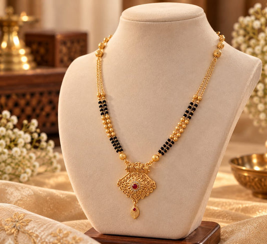 Gold-Tone Black Bead Mangalsutra with Ornate Diamond-Shaped Pendant